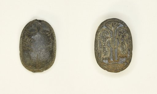 Scaraboid: Face Motif on Top; Two Figures Holding Flower on Base