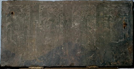 Stone panel carved in low relief with narrative scenes