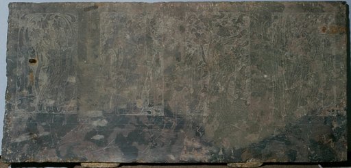 Stone panel carved in low relief with narrative scenes