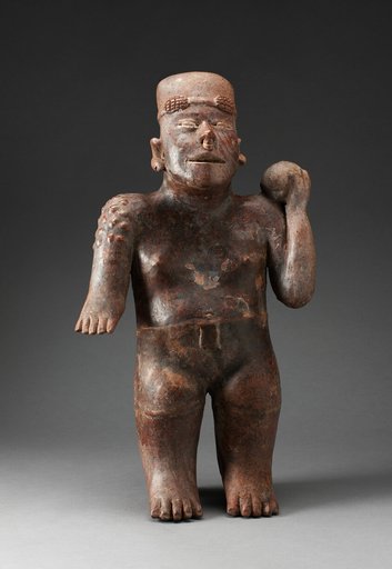 Standing Male Figure Holding a Ball