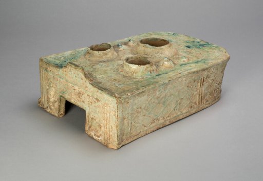 Stove with Figures and Geometric Designs