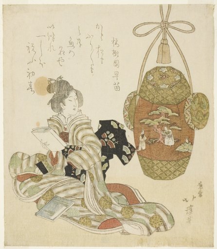Woman with book sitting next to a New Year pull toy