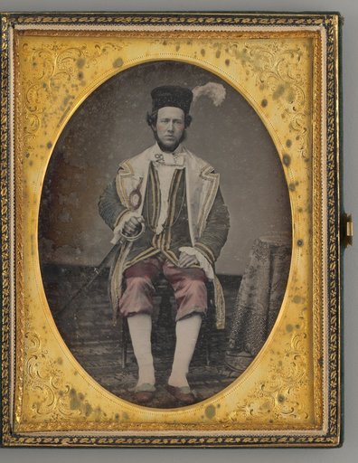 Untitled (Portrait of Seated Man, Wearing a Hat with a Feather)