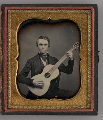 Untitled (Portrait of a Man Holding a Guitar)