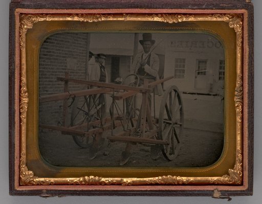 Untitled (Man with Top Hat Sitting on Carriage)