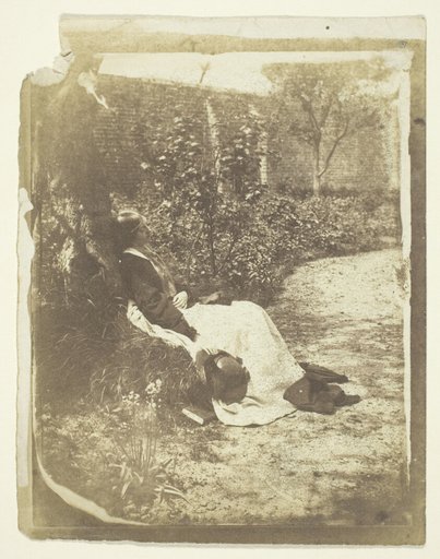 Mrs. Craik Reclining in Garden with Hat and Book