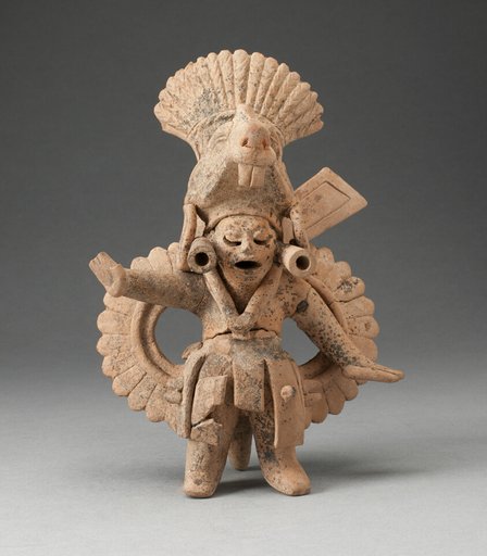 Dancing Figure Wearing Animal Headdress and Ornate Costume