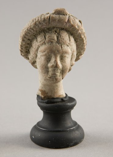 Head of a Woman Wearing Wreath