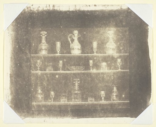 Articles of Glass on Three Shelves