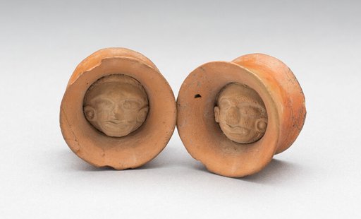 Pair of Earspools with Face in Interior