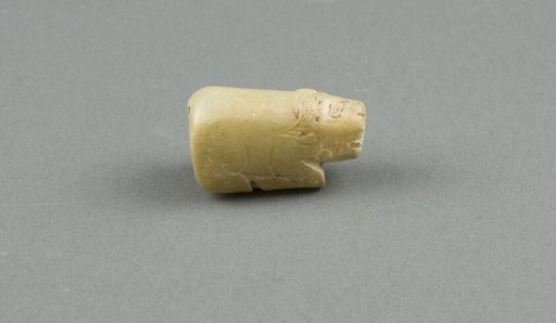 Bead, crouching buffalo.
