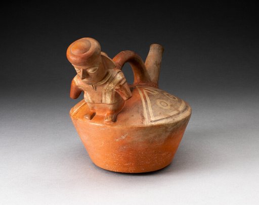 SIngle Spouted Vessel with Sculpted Figure Attached to the Handle