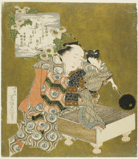 Puppeteer holding puppet on "go" board