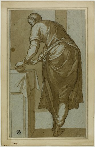 Standing Man Seen From Behind Cutting Bread