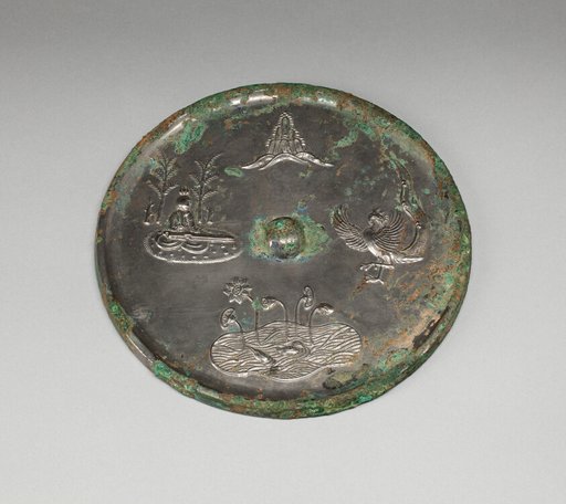 Mirror with Images of Purity and Immortality and “Lion and Grapevine” Design