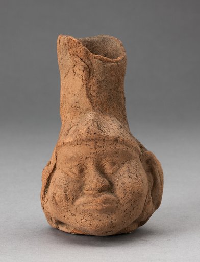 Heavily Eroded Miniature Jar in Form of a Human Head with Large Cheeks