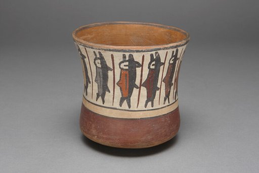 Cup Depicting a Band of Abstract Fish