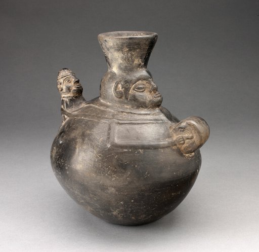 Jar in the Form of a Figure Holding a Drum and Carrying a Child