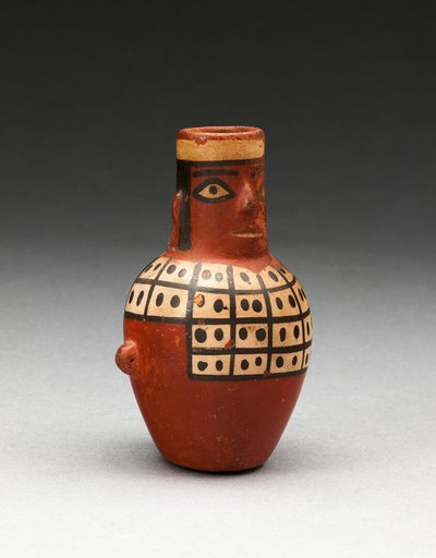 Miniature Jar in the Form of a Figure Wearing a Tunic