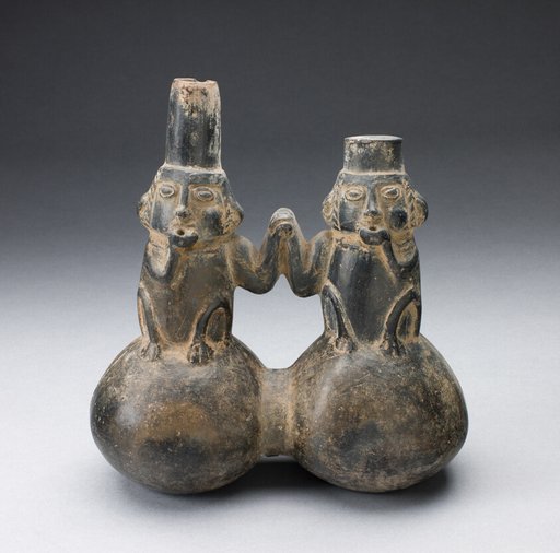 Double Vessel in the Form of Two Figures Drinking and Holding Hands