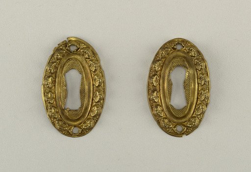 Pair of escutcheons