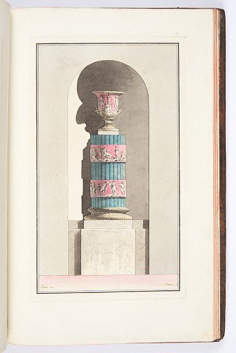 POELE formant colonne tronquée, cannelée, à bandeaux, orné de bas-reliefs et surmonté d’un vase antique