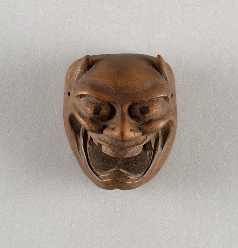 Grinning demon