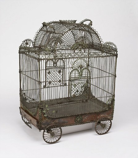 Bird cage in the form of a circus wagon