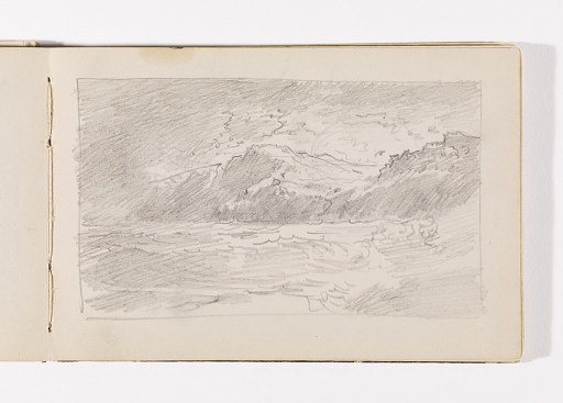 Waves Crashing on Beach with Row of Cliffs in Distance