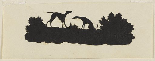 Two Dogs Near Some Bushes