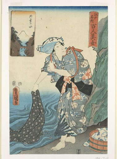 Woman washing fabric in a stream