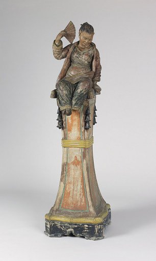 Figure on pedestal