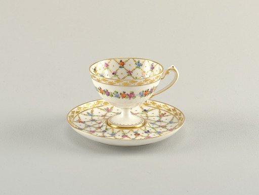 Footed Cup and Saucer with Diamond Lattice Pattern