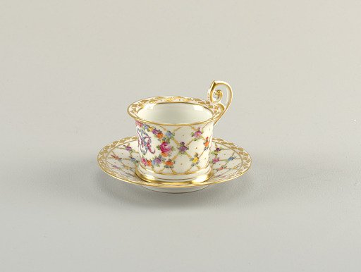 Cup and Saucer with Monogram and Diamond Lattice Pattern