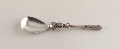 Spoon Adorned with a Rodent with Head Stuck Inside Clam Shell