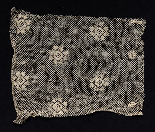Fragment of a Band with Floral Motif