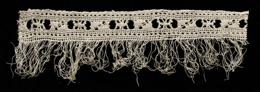Lace fragment with fringe