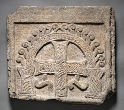 Relief Panel from the End of a Sarcophagus: A Cross Within an Arch