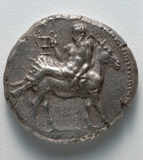 Tetradrachm: Dionysos with Kantharos on Donkey (obverse)