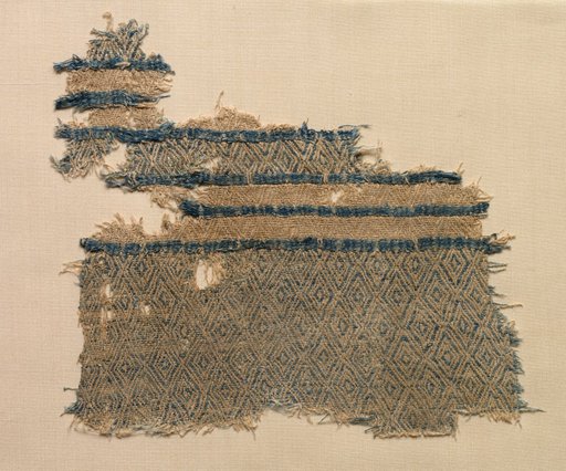 Fragment of linen damask with diamond designs in bands