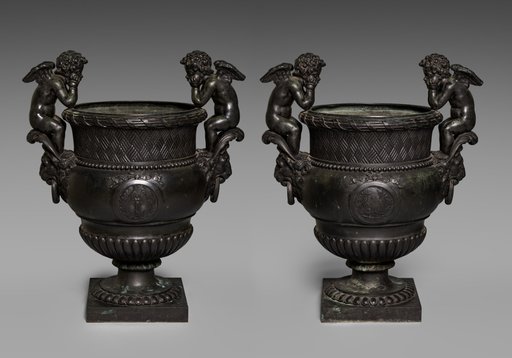 Pair of Urns with Putti