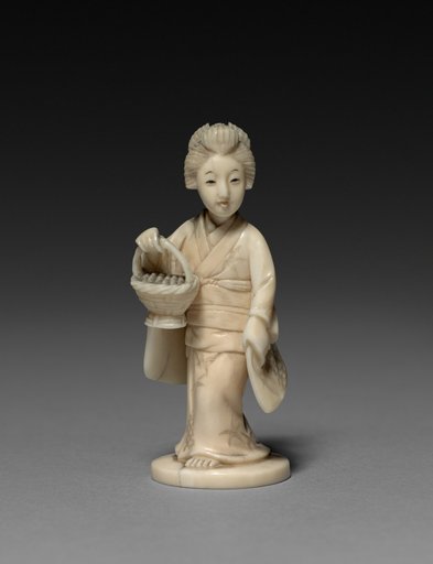 Woman Carrying a Basket