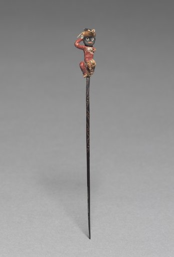 Pin with Yarn Figure