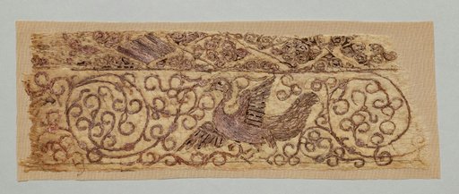 Embroidered fragment with bird among vines