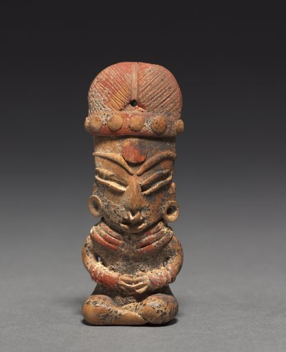 Seated Female Figurine