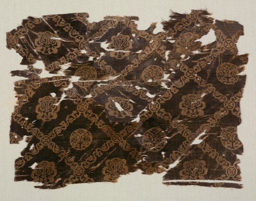Silk with lattice of animals in medallions