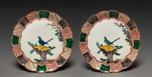 Pair of Dishes with Singing Bird on a Rock
