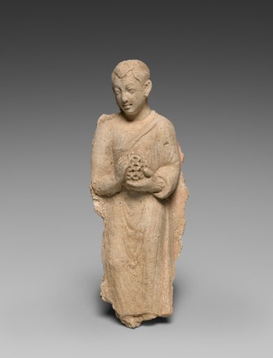 Monk bearing offerings