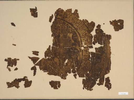 Fragment with falconer riding a bull in a rondel