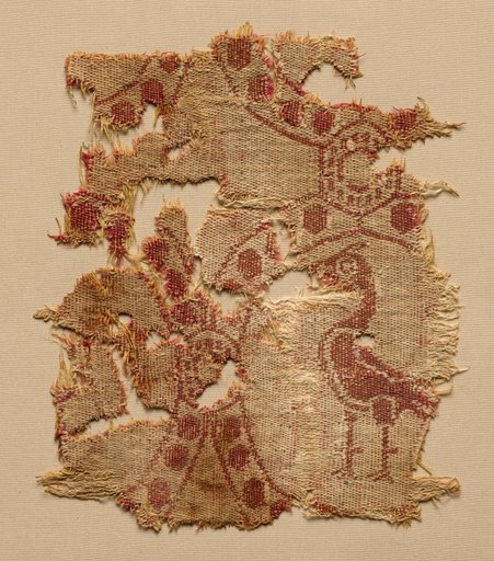 Fragment of roundels with single bird